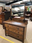 Antique furniture, early 20th century dark wood dressing table with swivel mirror, base with run