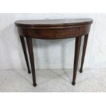 Antique furniture, Half moon side table on tapered legs opening to make a round card table, the