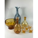 Vintage glass, a collection of vintage Amber glass to include decanter with glasses, vase, bowl, and