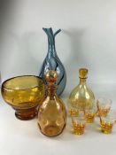 Vintage glass, a collection of vintage Amber glass to include decanter with glasses, vase, bowl, and