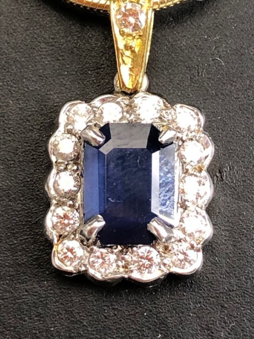 18ct sapphire and diamond pendant, cushion cut sapphire surrounded by diamonds on a rolled - Image 3 of 6