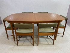 Mid Century dining room table, extendable, with single central leaf, by maker A.H. McIntosh & Co