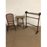 Antique furniture, 3 items being a dark wood towel rack, a nursing chair with wicker seat and