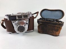 Vintage Kodak Retinette 1B Pronator 500LX 35mm Camera in its case, and a pair of opera glasses in