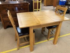 Small modern extending dining / kitchen table and two chairs, table approx 113cm x 80cm fully
