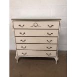 Mid century furniture, chest of 5 drawers in off white finish with wreath design mouldings, and