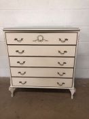 Mid century furniture, chest of 5 drawers in off white finish with wreath design mouldings, and