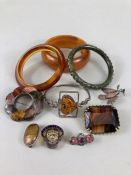 Collection of Costume jewellery to include brooches and polished Scottish stone jewellery (10)