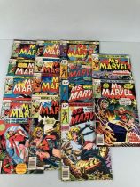 Marvel comics , collection of comics from the 1970s featuring Ms Marvel random numbers between 3 -