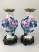 Chinese Cloisonne, pair of Chinese Cloisonne vases of bolster shape, white background decorated with