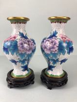 Chinese Cloisonne, pair of Chinese Cloisonne vases of bolster shape, white background decorated with