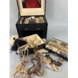 Costume jewellery, a quantity of vintage costume jewellery in a leatherette jewellery case to