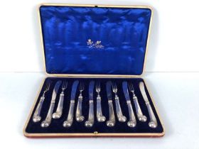 Fully hallmarked twelve piece Silver handled (EPNS blades) fruit knife and forks by makers