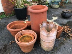 Collection of terracotta pots and chimneys (8) tallest chimney 51cm tall