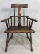 Antique rustic armchair with turned stick back and pierced splat, possibly Irish
