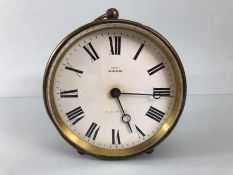 Antique clock, Brass cased drum mantel clock printed dial with Roman numerals marked EXD By MANN