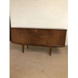 Mid century furniture, Mcintosh Novia sideboard on central tapered legs, comprising of 2 cupboards