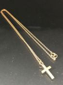 9ct Gold Cross on a fine necklace chain also 9ct and approx 40cm in length and 1.2g