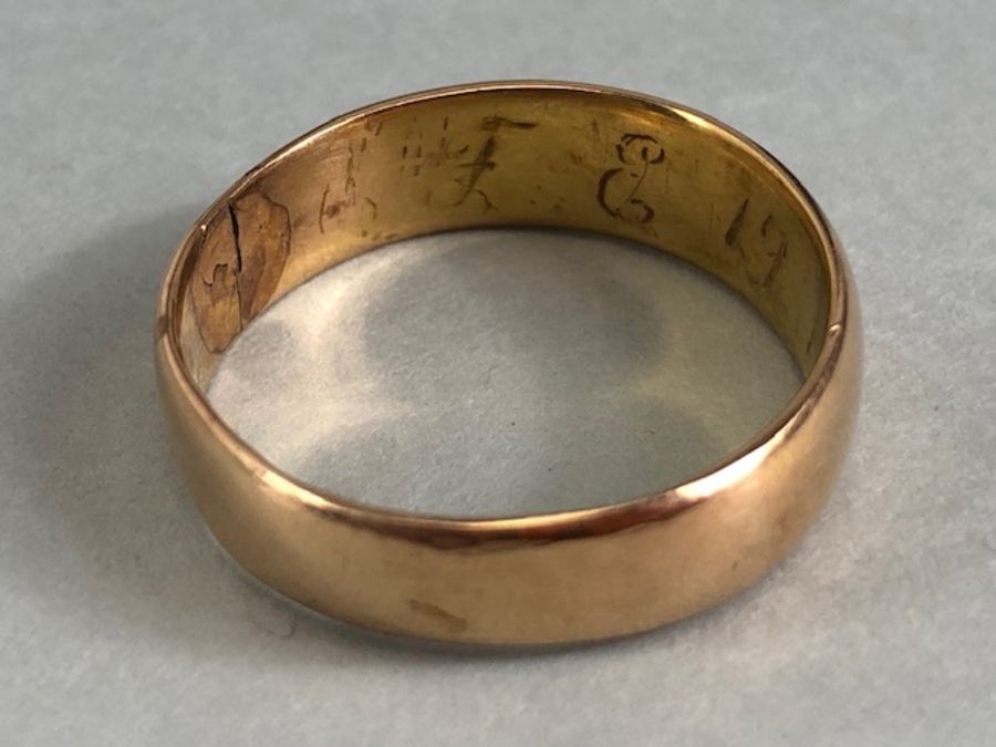 Unmarked Gold Band (tests as 18ct or above) A/F. Size approx V and 6.4g