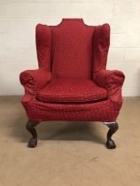 Antique furniture, Gentleman's wing back armchair of good proportions with ball and claw feet,