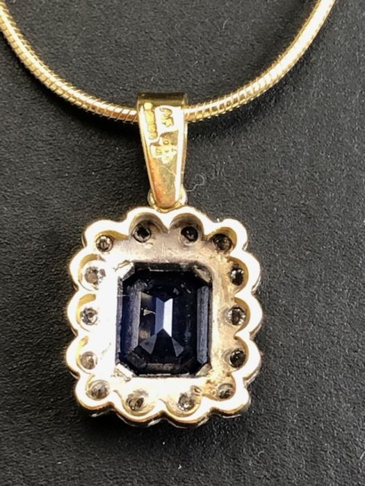 18ct sapphire and diamond pendant, cushion cut sapphire surrounded by diamonds on a rolled - Image 5 of 6
