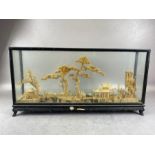 Oriental interest, Chinese carved cork diorama of a village scean in black lacquered glass case ,