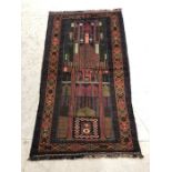 Oriental Rug, Hand Knotted Wool Old Baluchi Rug with geometric design approximately 136 x 79cm.