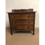 Antique furniture, early 20th century chest of drawers in dark wood, run of 3 drawers reeded