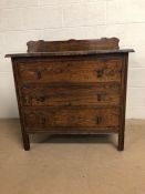 Antique furniture, early 20th century chest of drawers in dark wood, run of 3 drawers reeded