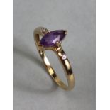 9ct Oval Amethyst with diamond shoulders approx size 'R'