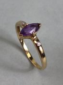 9ct Oval Amethyst with diamond shoulders approx size 'R'