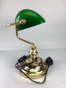 Desk lamp, 20th century Clarks desk lamp, yellow metal base with green glass shade.