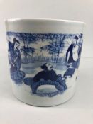 Oriental blue and white Chinese brush pot decorated with people, six character marking to base