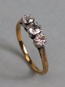 Three stone Diamond ring on yellow Gold size approx K