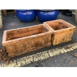 Two terracotta garden planters one square one oblong