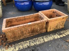 Two terracotta garden planters one square one oblong