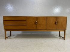Mid Century sideboard by A.H. McIntosh & Co Ltd with three drawers to the left hand side,