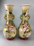 Japanese Vases, a pair of pottery vases with hand painted and enamel designs of birds and