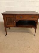 Antique furniture, Edwardian side board on casters with cupboard and single draw, typical inlay