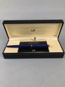 Dunhill Pen , Blue stardust slim line ball point pen with gilt mounts in box and slip case with