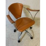 Mid century Style upholstered and chrome framed office chair on casters