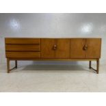 Mid Century sideboard by A.H. McIntosh & Co Ltd with three drawers to the left hand side,