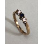 9ct Gold three stone diamond and Sapphire set ring size approx 'K'