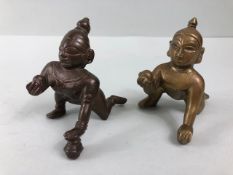 oriental interest , Two Antique bronze Hindu figures of a crawling Krishna, in usual form each