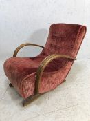 Original art deco armchair with scroll arms and sprung seat with button back red upholstory and