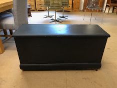 Pine black painted chest on castors with metal handles approx 110cm x 38cm x 55cm