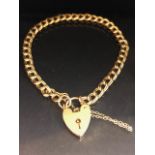 9ct Gold double link chain bracelet with 9ct Heart Shaped lock and safety chain, approx 20cm in