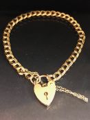 9ct Gold double link chain bracelet with 9ct Heart Shaped lock and safety chain, approx 20cm in