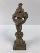 Oriental interest, Brass Hindu oil lamp fashioned in the form of the deity Laxmi approximately