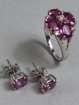 18ct White Gold ring and earring set both set with Pink Sapphires (possibly dyed) the ring set